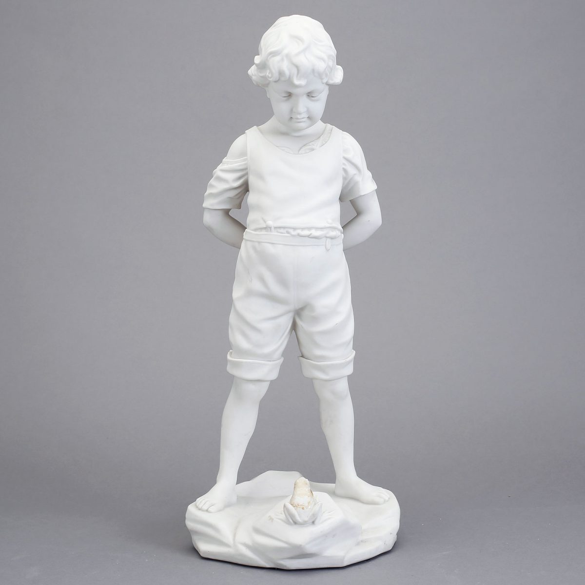 Parian sculpture "Gosse med groda" (Boy with frog). 1900-1925. Height 48 cm / 18.9 inches.