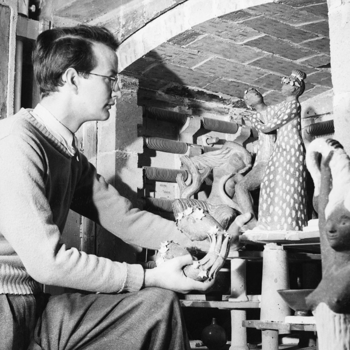 Stig Lindberg holding a unique pre-production "Narcissus".